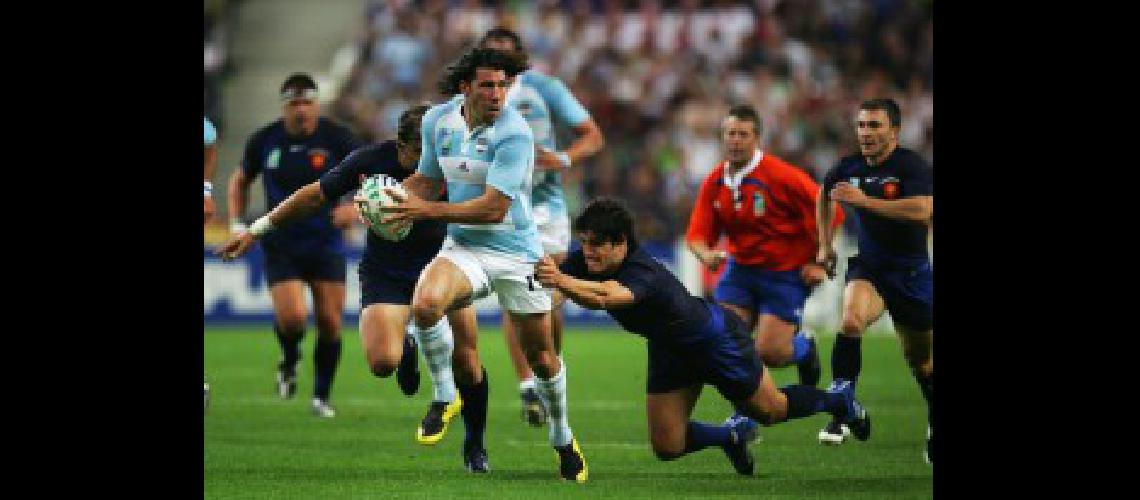 SAINT-DENIS FRANCE - SEPTEMBER 07- Ignacio Corleto of Argentina makes a break during the opening match of the Rugby World Cup 2007 between France and Argentina at the Stade de France on September 7 2007 in Saint-Denis France (Photo by Laurence GriffithsGetty Images)