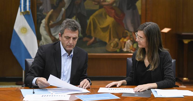Massa y Raverta antes del anuncio
